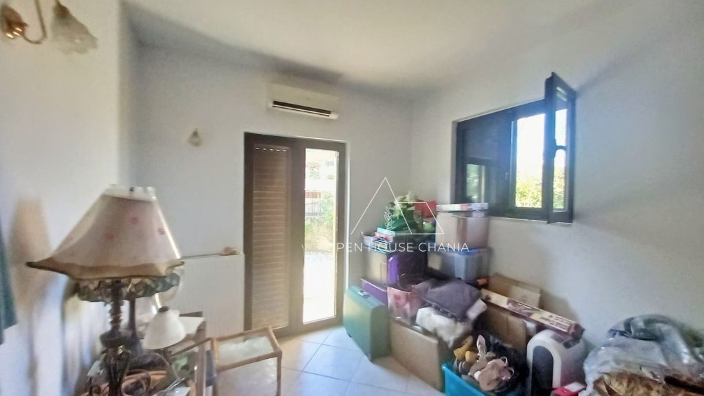 Α two-bedroom ground floor house with a nice garden in Neriana