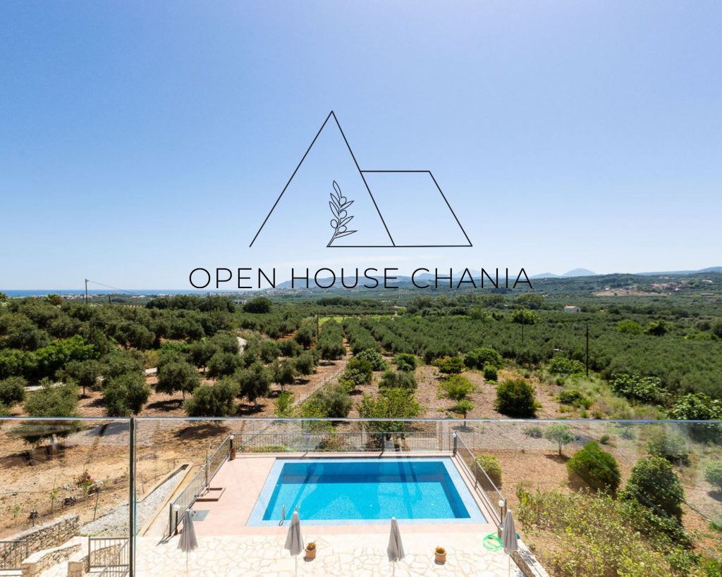 A three-level villa with a tennis court in Kournas