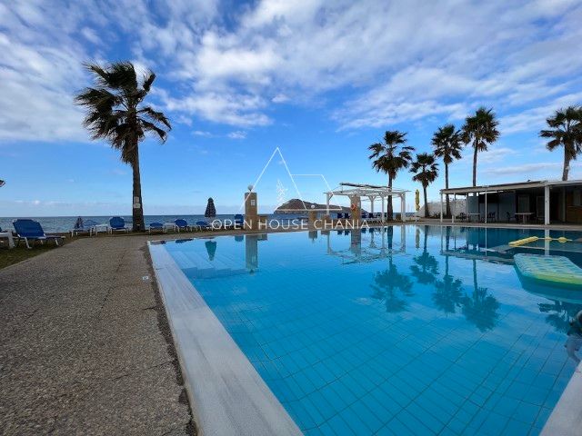 A LARGE SEAFRONT HOTEL IN AGIA MARINA