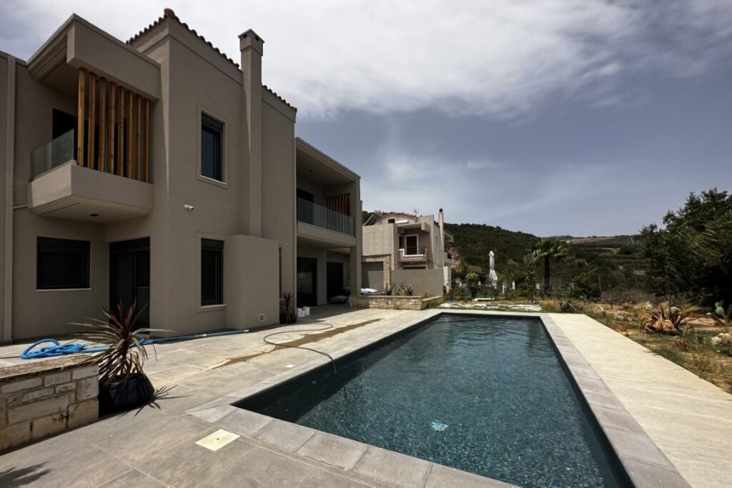 A BRAND NEW HIGH-END VILLA IN KOLYMVARI