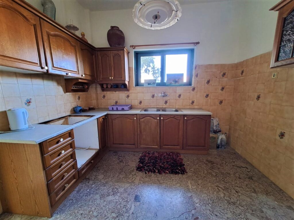 A THREE BEDROOM FLAT IN KALYVES