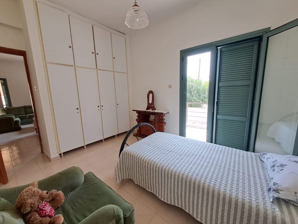 A THREE BEDROOM FLAT IN KALYVES