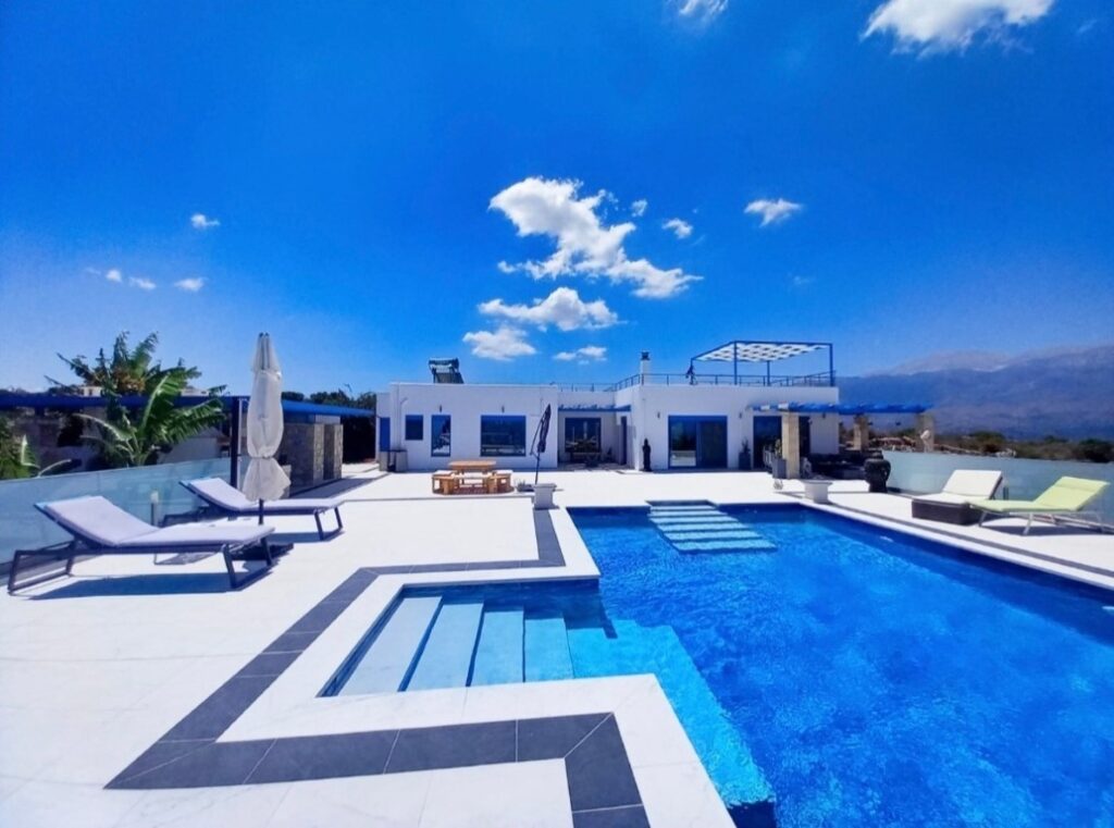 STUNNING WHITE & BLUE VILLA WITH PANORAMIC SEA VIEWS & AN INFINITY POOL IN LITSARDA