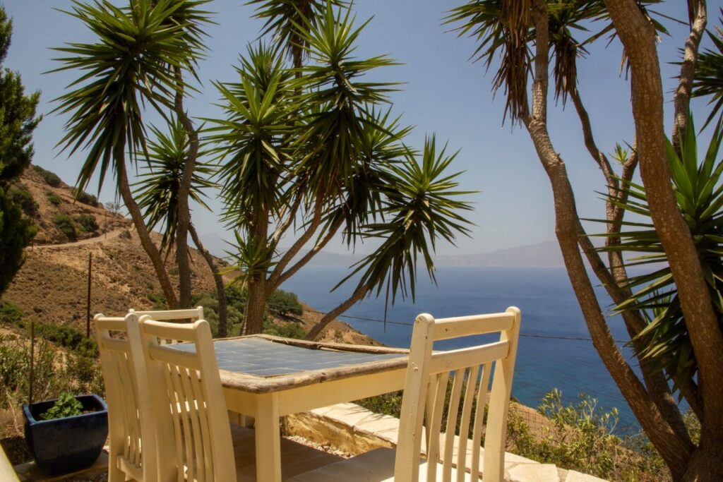 A VILLA PERCHED ON THE SEAFRONT HILLSIDE OF RAVDOUCHA