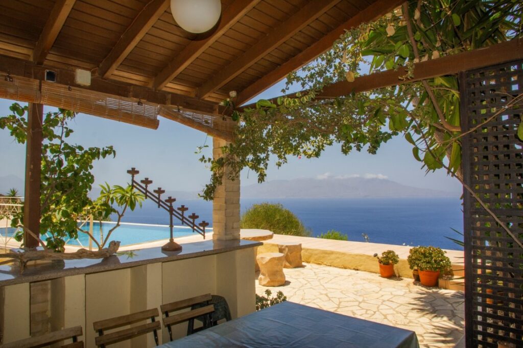 A VILLA PERCHED ON THE SEAFRONT HILLSIDE OF RAVDOUCHA