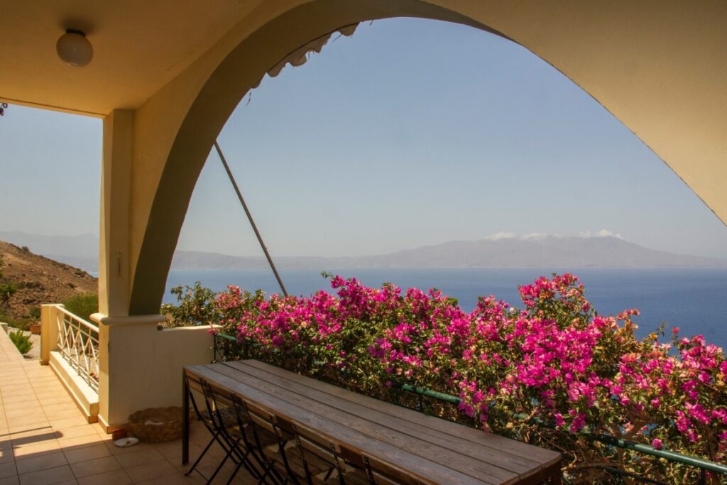 A VILLA PERCHED ON THE SEAFRONT HILLSIDE OF RAVDOUCHA