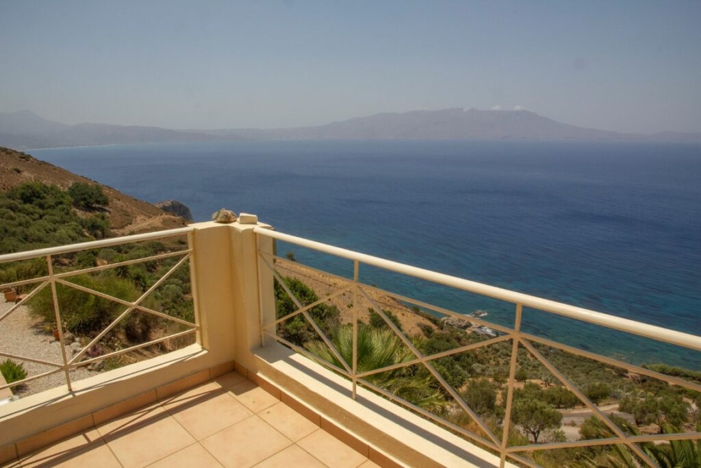 A VILLA PERCHED ON THE SEAFRONT HILLSIDE OF RAVDOUCHA