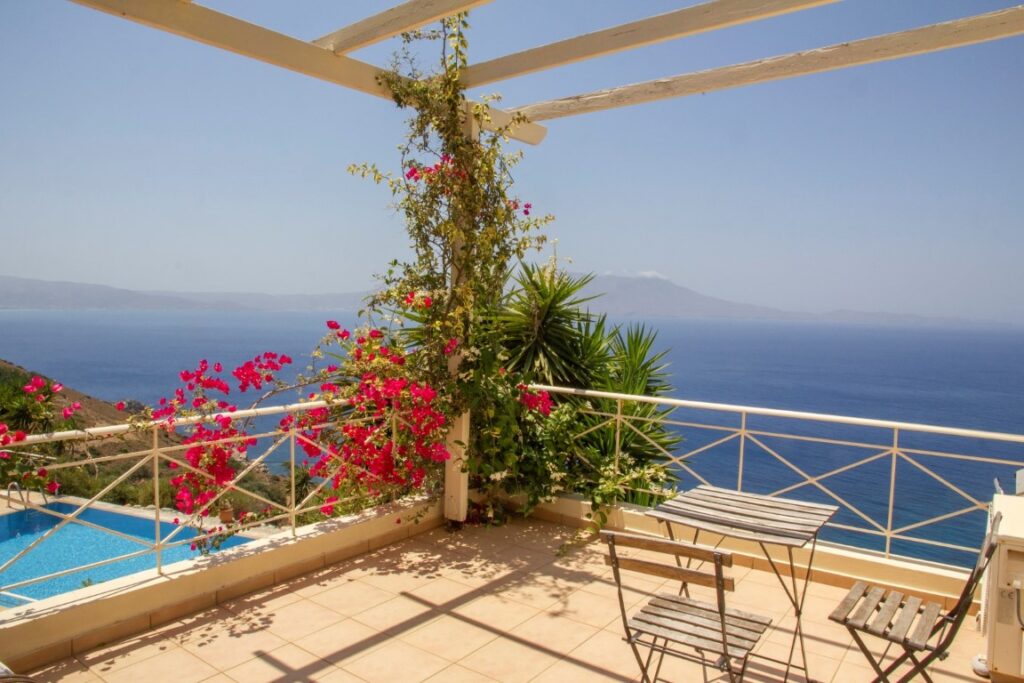 A VILLA PERCHED ON THE SEAFRONT HILLSIDE OF RAVDOUCHA