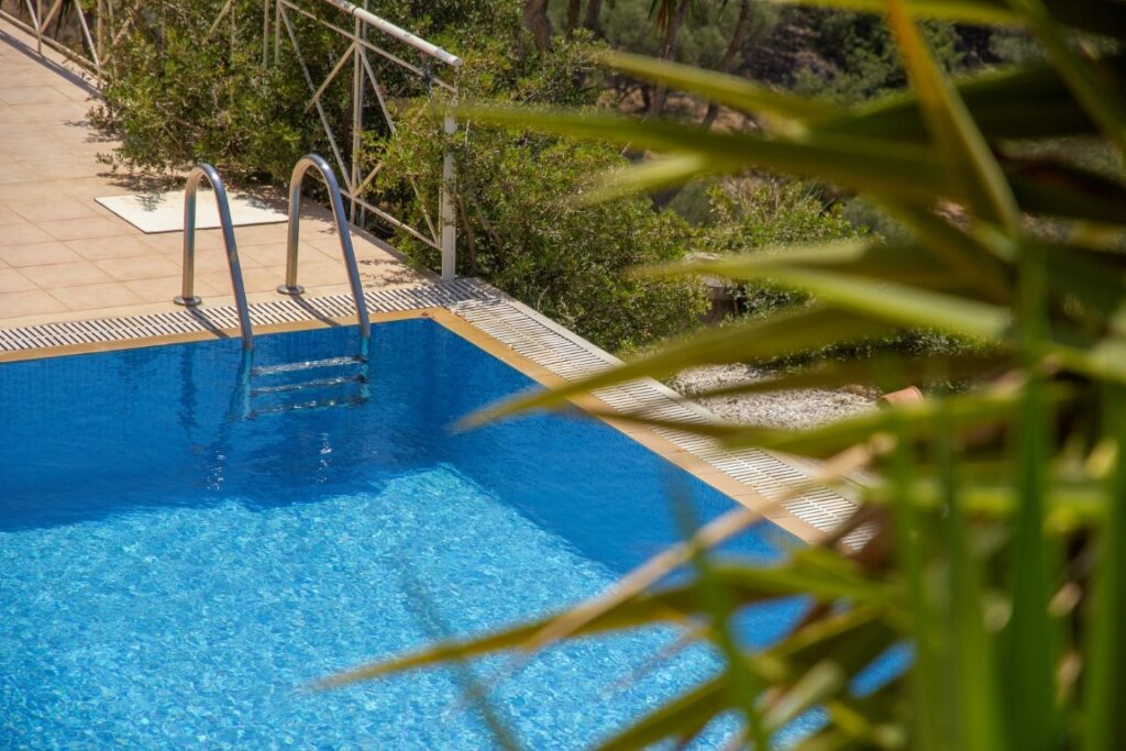 A VILLA PERCHED ON THE SEAFRONT HILLSIDE OF RAVDOUCHA