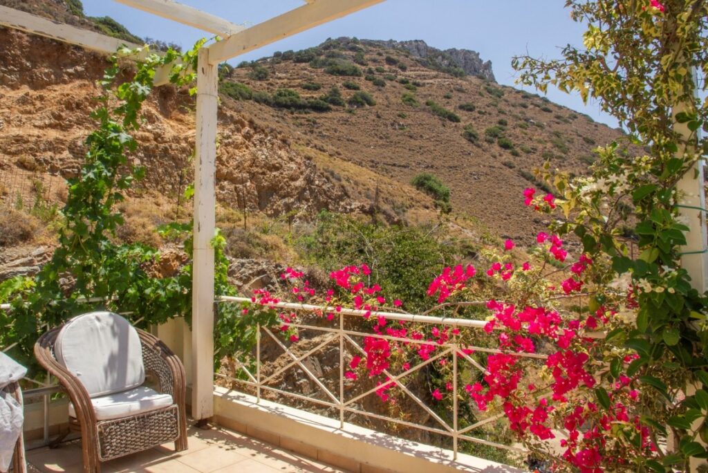 A VILLA PERCHED ON THE SEAFRONT HILLSIDE OF RAVDOUCHA