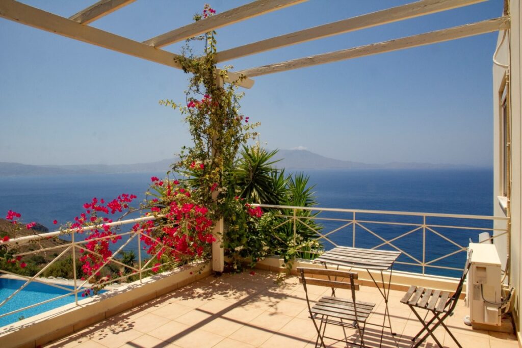 A VILLA PERCHED ON THE SEAFRONT HILLSIDE OF RAVDOUCHA