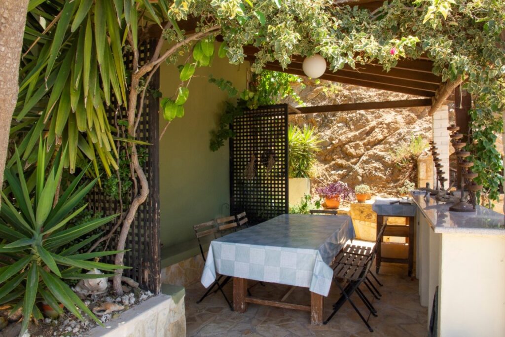 A VILLA PERCHED ON THE SEAFRONT HILLSIDE OF RAVDOUCHA