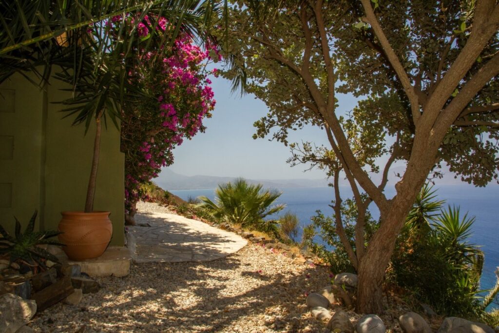 A VILLA PERCHED ON THE SEAFRONT HILLSIDE OF RAVDOUCHA