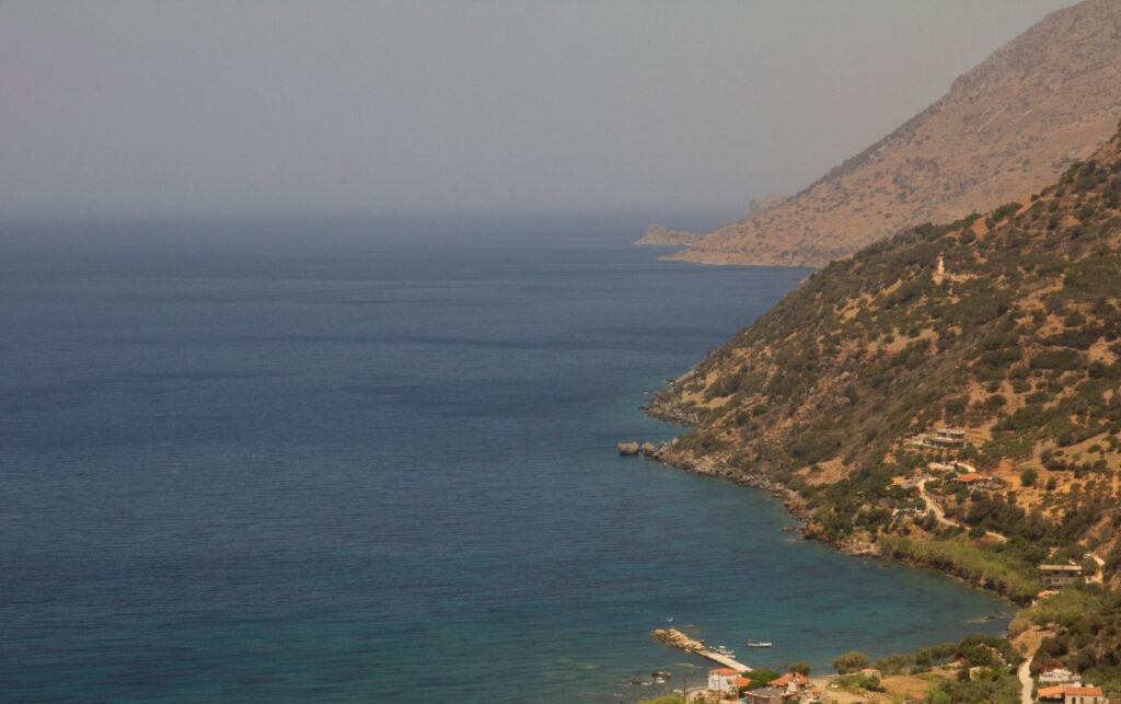 A VILLA PERCHED ON THE SEAFRONT HILLSIDE OF RAVDOUCHA