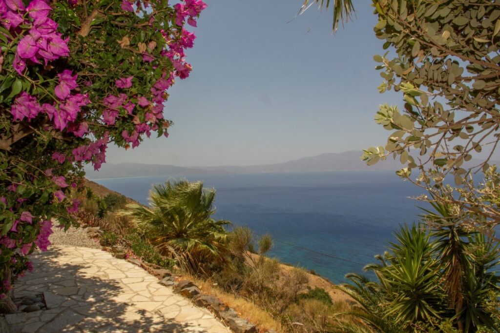 A VILLA PERCHED ON THE SEAFRONT HILLSIDE OF RAVDOUCHA