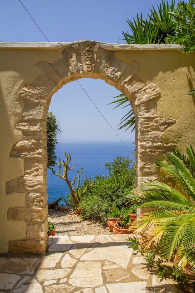 A VILLA PERCHED ON THE SEAFRONT HILLSIDE OF RAVDOUCHA