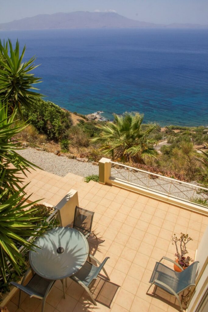 A VILLA PERCHED ON THE SEAFRONT HILLSIDE OF RAVDOUCHA