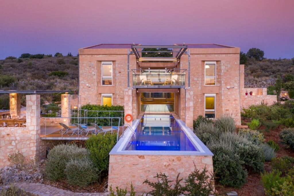 LUXURY VILLA WITH INDOOR-OUTDOOR POOL AND PANORAMIC VIEWS FOR SALE IN APOKORONAS