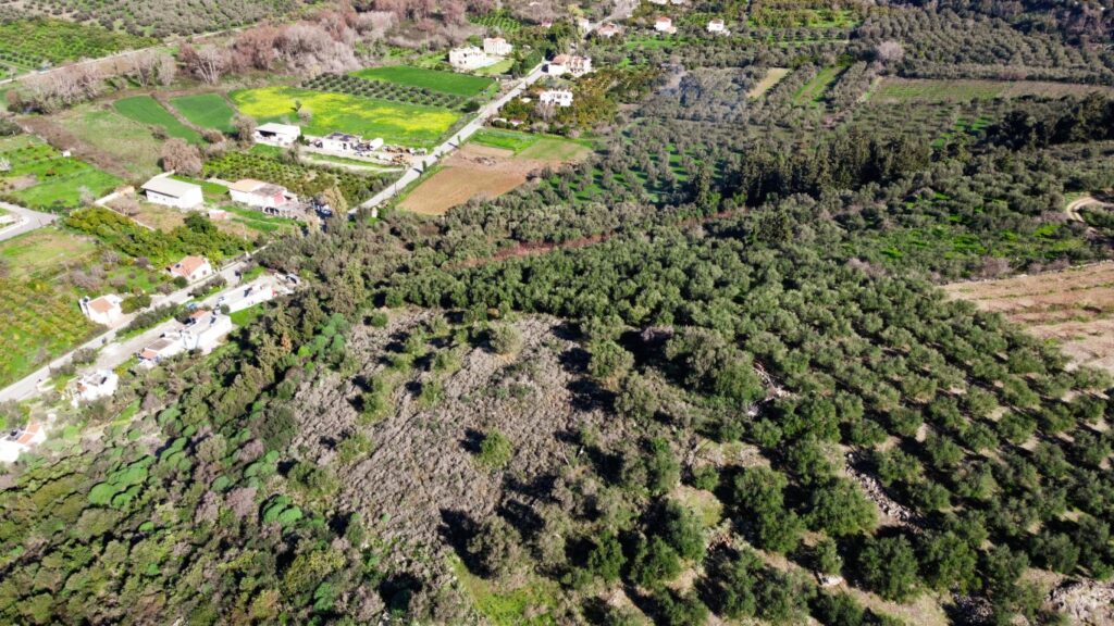 A MASSIVE PLOT OF MORE THAN 13,000 SQM WITH BREATHTAKING VIEWS ON THE ENTRANCE OF ARMENOI VILLAGE