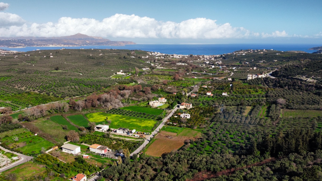 A MASSIVE PLOT OF MORE THAN 13,000 SQM WITH BREATHTAKING VIEWS ON THE ENTRANCE OF ARMENOI VILLAGE